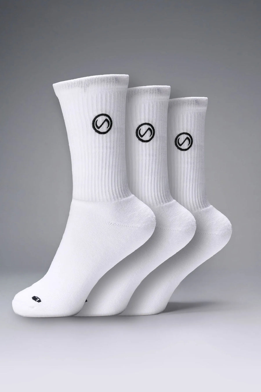 3 Pack Of White TLF Evolve Crew Socks featuring an extended cuff height, ribbed cuff, cushioned footbed and seamless toe