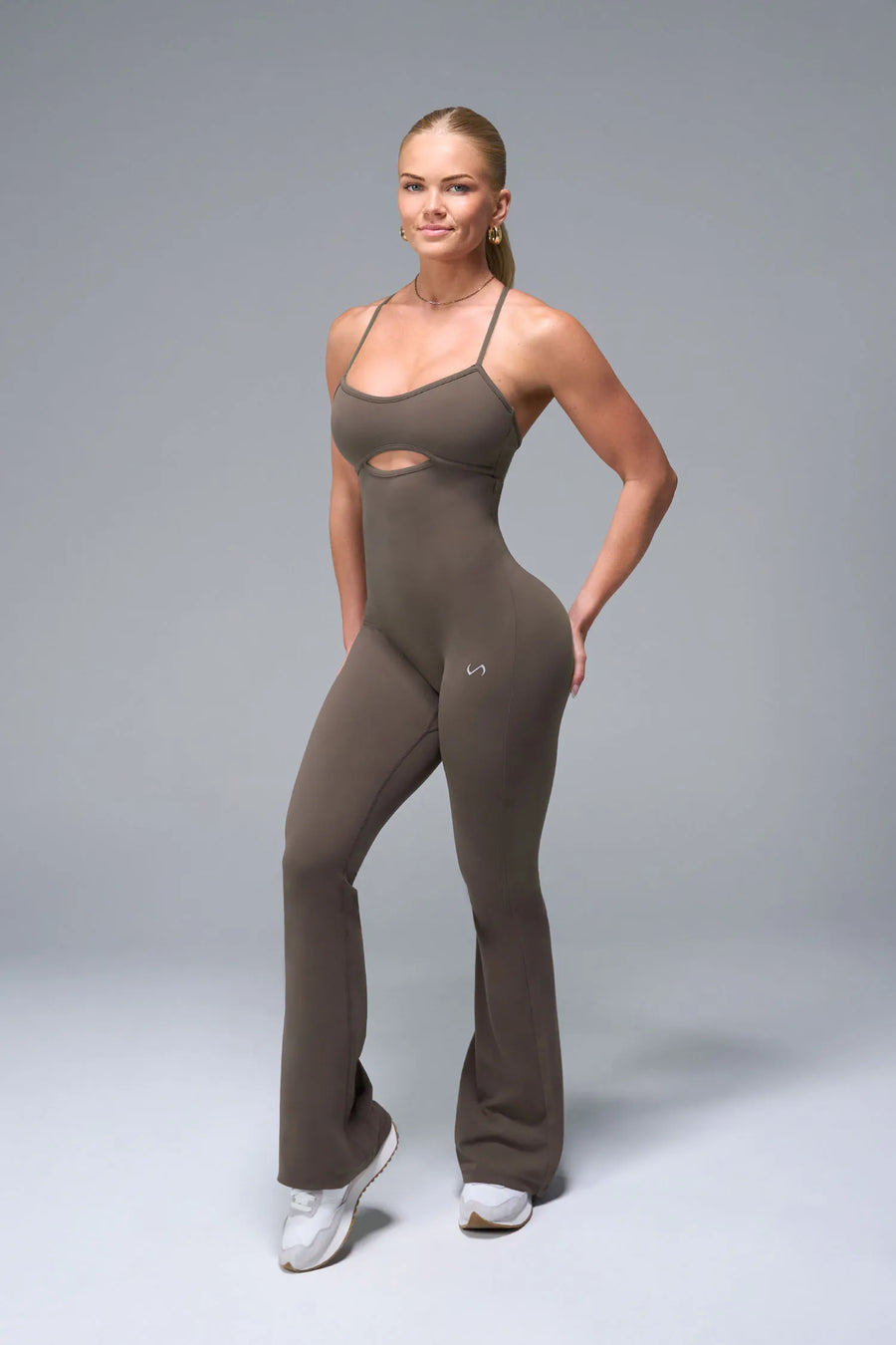 Front View of Brown TLF NeoCloud™ Flare Jumpsuit featuring a built-in low support sports bra with removable pads and adjustable straps