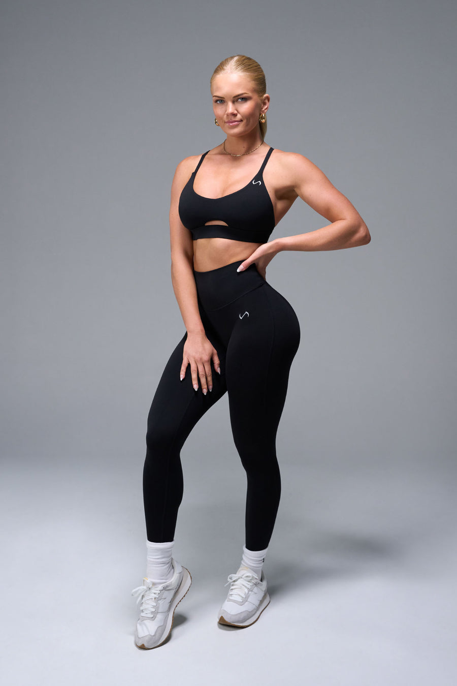 Front View of Black TLF NeoCloud™ Secret Glute Seam Leggings featuring our new secret glute seam technology to lift and shape your glutes. 