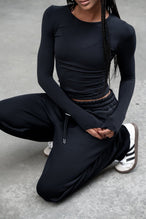 Front View Of Women's Essential Seamless Long Sleeve Top in Black