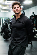 Product Lifestyle Image GTS Quad Tech Quarter-Zip Pullover Black
