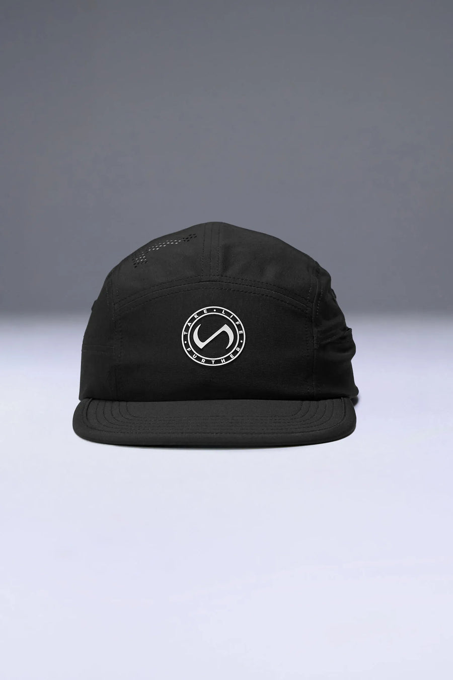 Black Pluma Packable Hat showing low profile side silhouette and breathable performance fabric by TLF Apparel – front view 