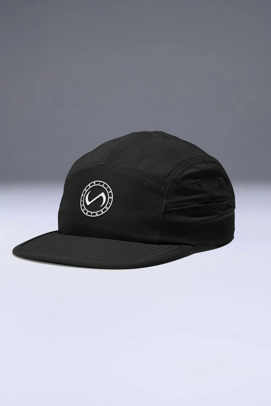 Black Pluma Packable Hat showing low profile side silhouette and breathable performance fabric by TLF Apparel – side view 