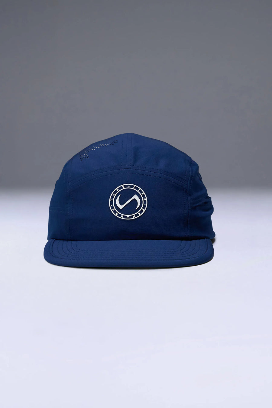 Blue Pluma Packable Hat showing low profile side silhouette and breathable performance fabric by TLF Apparel – front view 