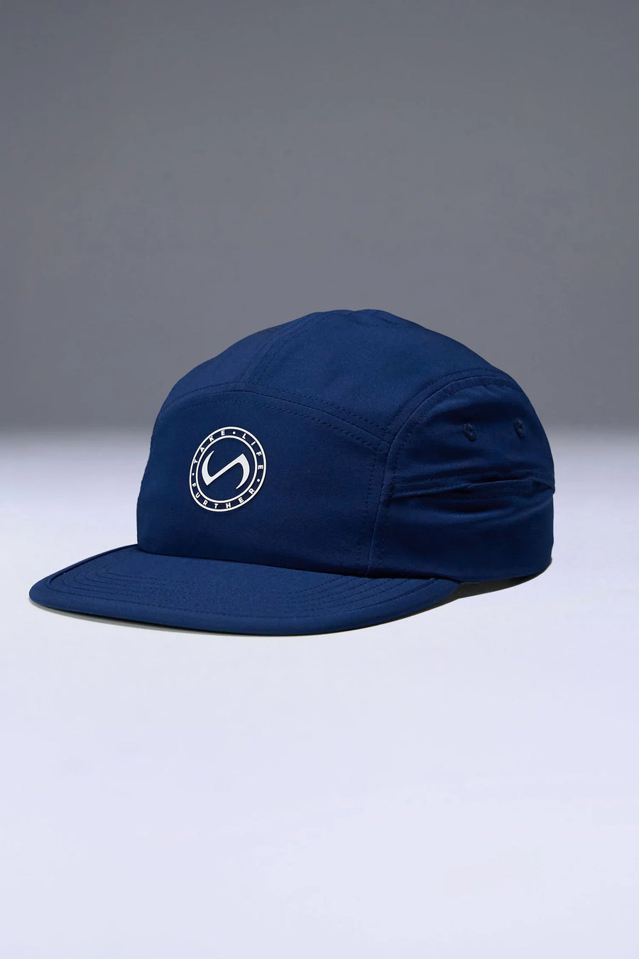 Blue Pluma Packable Hat showing low profile side silhouette and breathable performance fabric by TLF Apparel – side view 