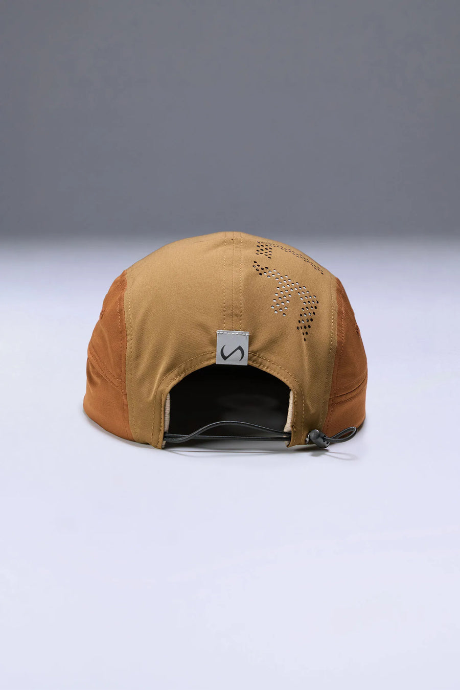 Brown Pluma Packable Hat with adjustable rear bungee cord lock and reflective logo clip label by TLF Apparel – back view 