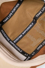 Sahara Tri-Color Pluma Packable Hat showing laser perforated crown panel and lightweight ripstop fabric detail by TLF Apparel – detail view