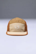Brown Pluma Packable Hat showing low profile side silhouette and breathable performance fabric by TLF Apparel – front view