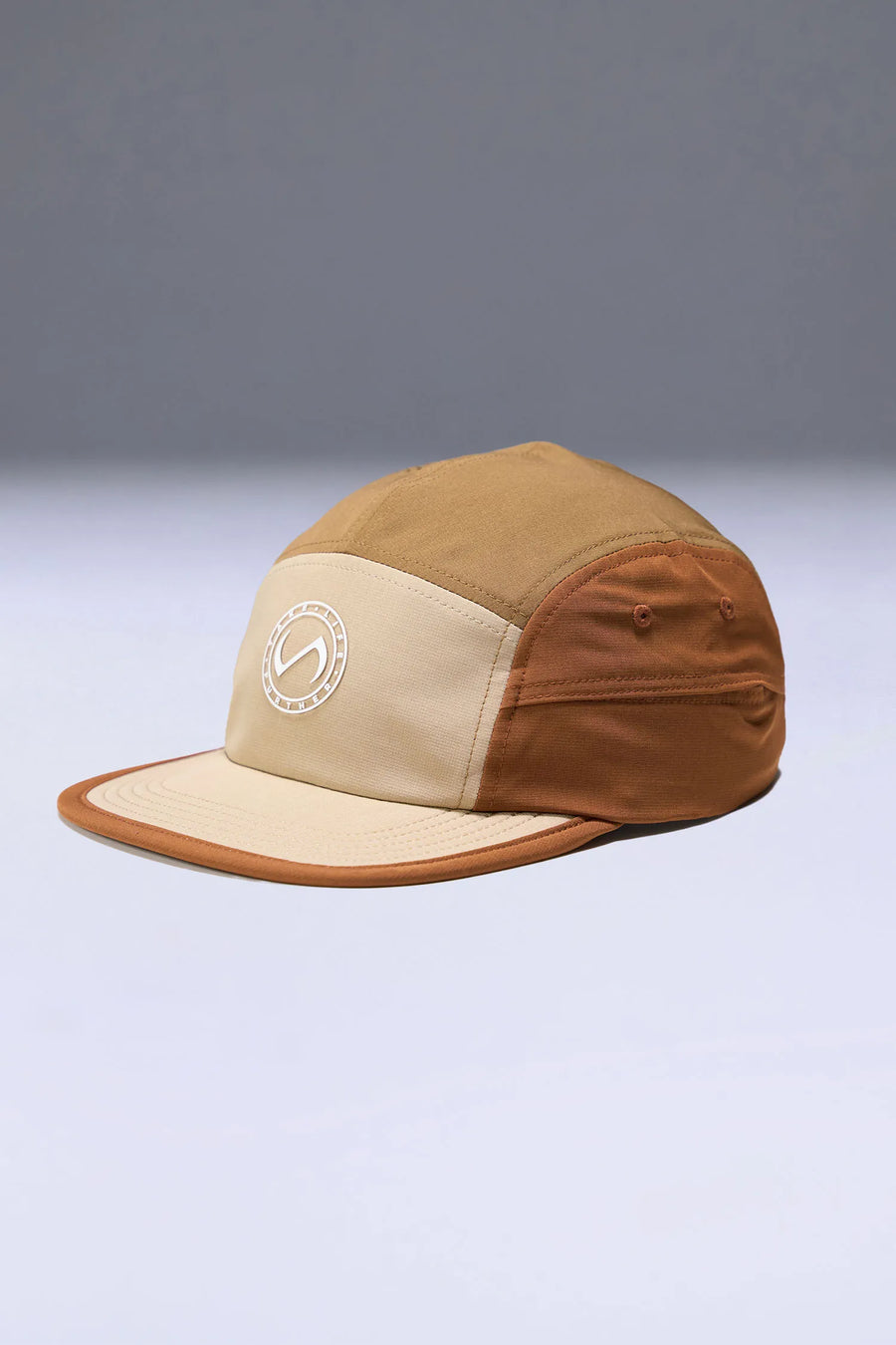 Brown Pluma Packable Hat showing low profile side silhouette and breathable performance fabric by TLF Apparel – side view