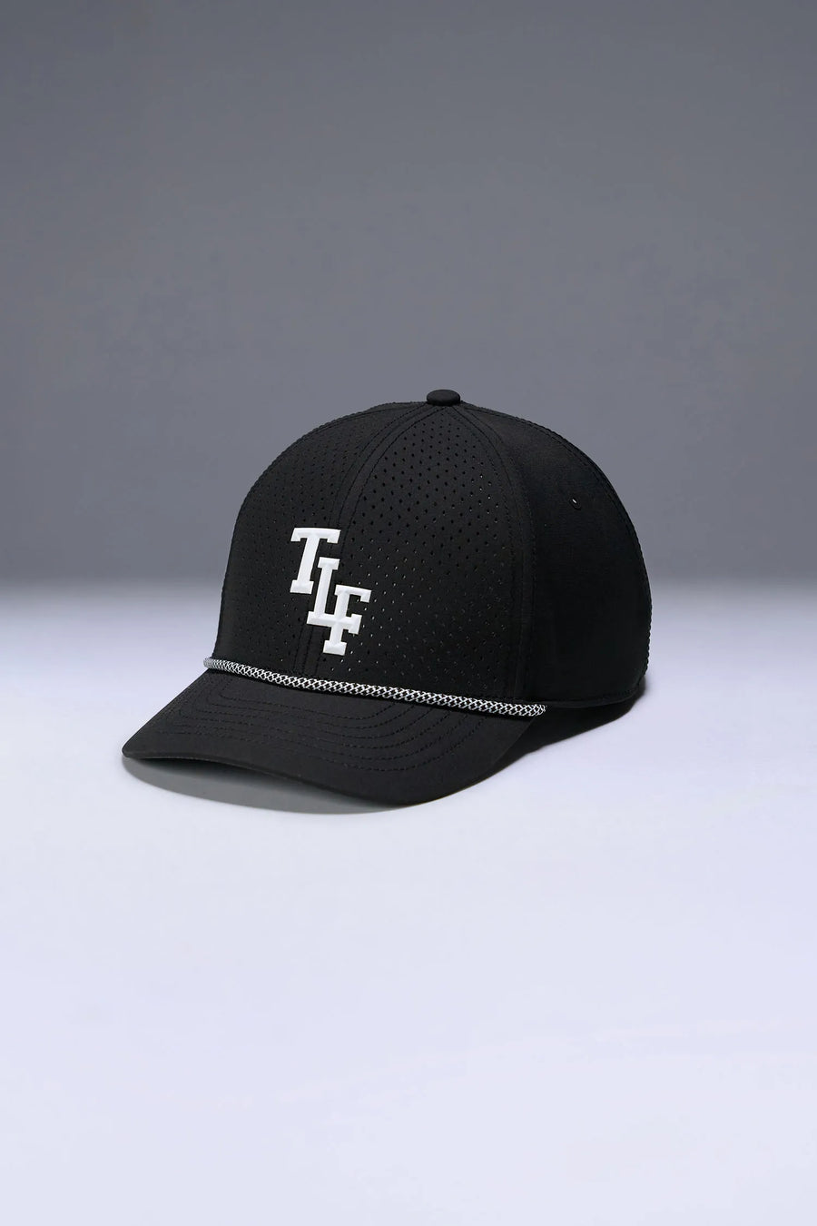 Black Flex Grid Varsity Rope Hat with structured silhouette and rope accent across front panel by TLF Apparel – side view 