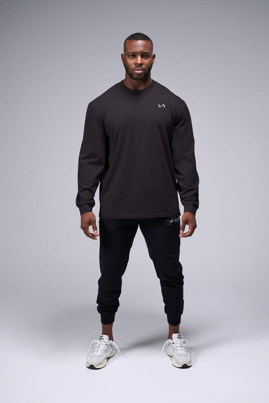 Front View of Black TLF Arc Dura Cotton Oversized Long Sleeve, durable, vintage wash tee for gym or street wear