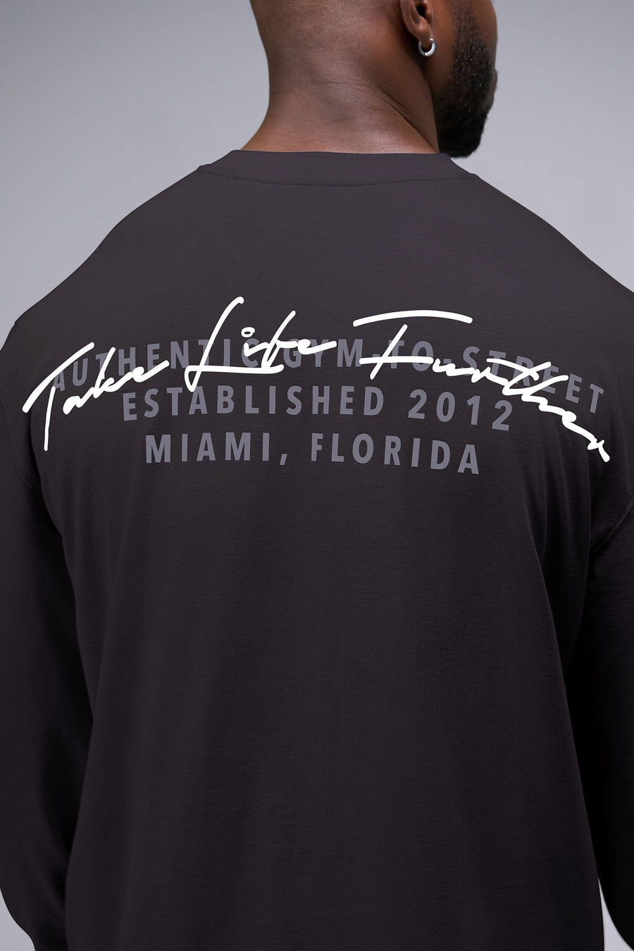 Detail Back View of Black TLF Arc Dura Cotton Oversized Long Sleeve, durable, vintage wash tee for gym or street wear