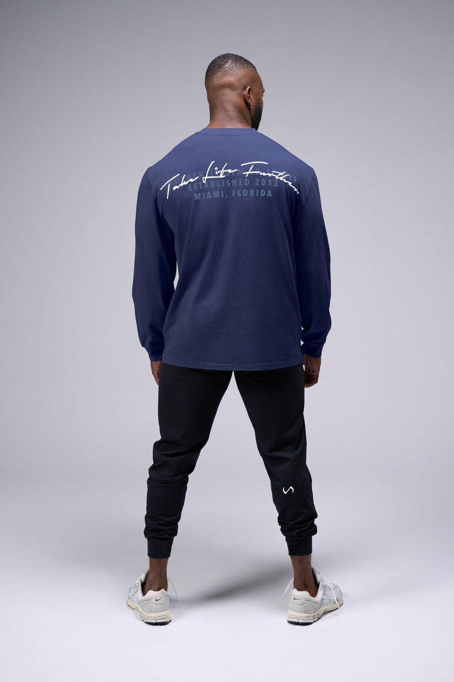 Back View of Deep Navy TLF Arc Dura Cotton Oversized Long Sleeve, durable, vintage wash tee for gym or street wear
