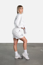 Side View of White Athletic Club Oversized Shorts