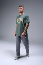 Back View of Green TLF Athletic Dept Cotton Luxe Oversized Tee featuring a bold 2 one graphic print design across the chest in our oversized shirt fit