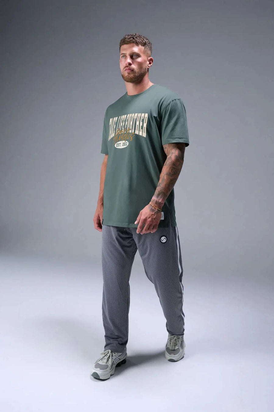 Back View of Green TLF Athletic Dept Cotton Luxe Oversized Tee featuring a bold 2 one graphic print design across the chest in our oversized shirt fit