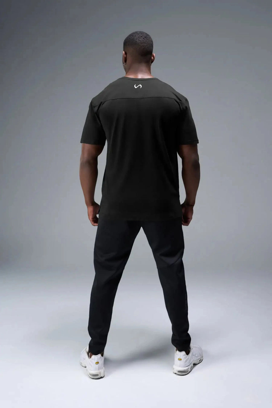 Back View of Black TLF Athletic Dept Cotton Luxe Oversized Tee featuring a bold 2 one graphic print design across the chest in our oversized shirt fit