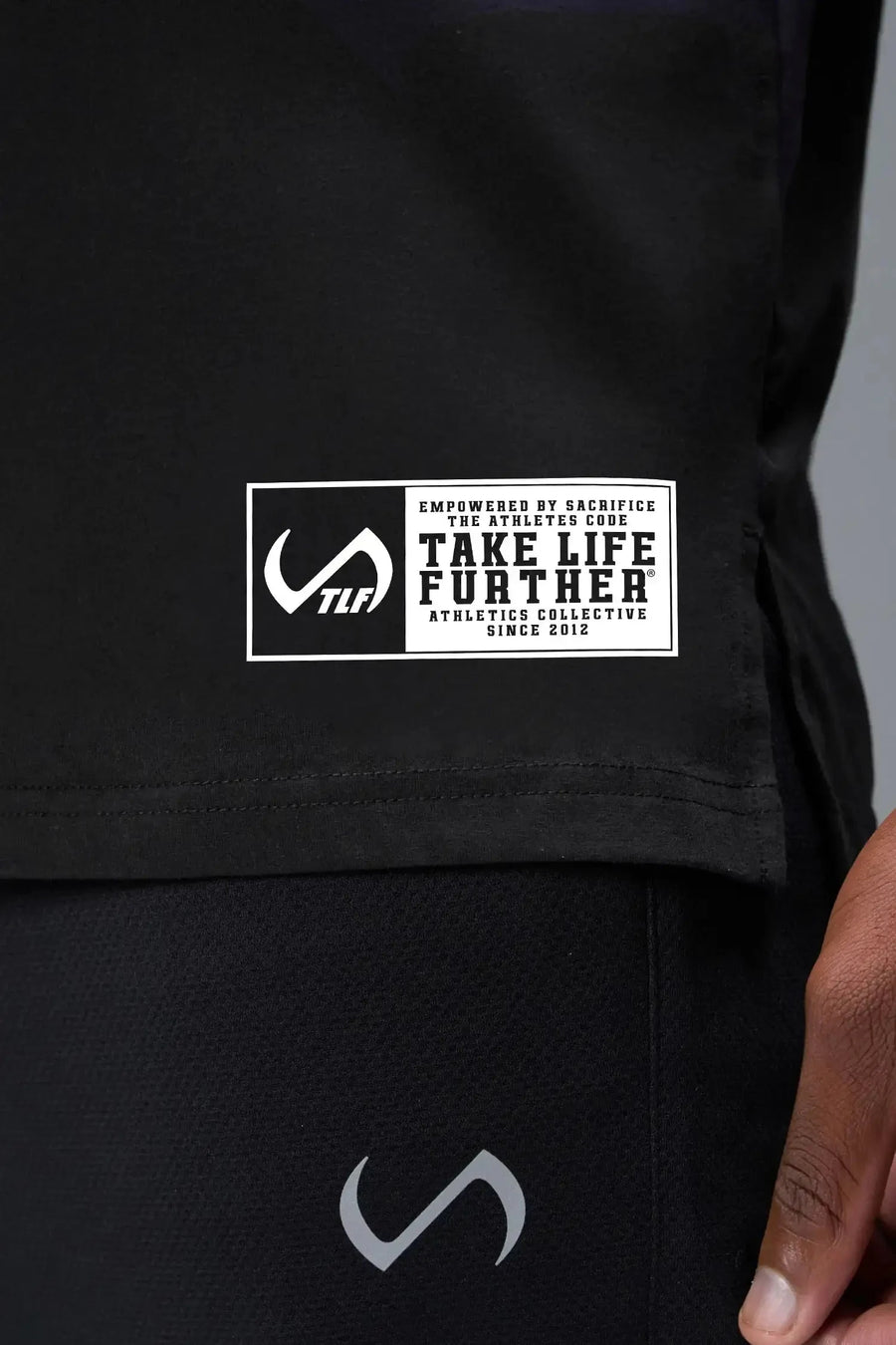 Detail Front View of Black TLF Athletic Dept Cotton Luxe Oversized Tee featuring a bold 2 one graphic print design across the chest in our oversized shirt fit