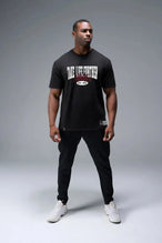 Front View of Black TLF Athletic Dept Cotton Luxe Oversized Tee featuring a bold 2 one graphic print design across the chest in our oversized shirt fit