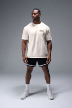Front View of Off White TLF Digital Camo Cotton Luxe Oversized Tee featuring a pixelated camo print design across the back in our oversized t shirt fit
