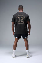 Back View of Black TLF Digital Camo Cotton Luxe Oversized Tee featuring a pixelated camo print design across the back in our oversized t shirt fit