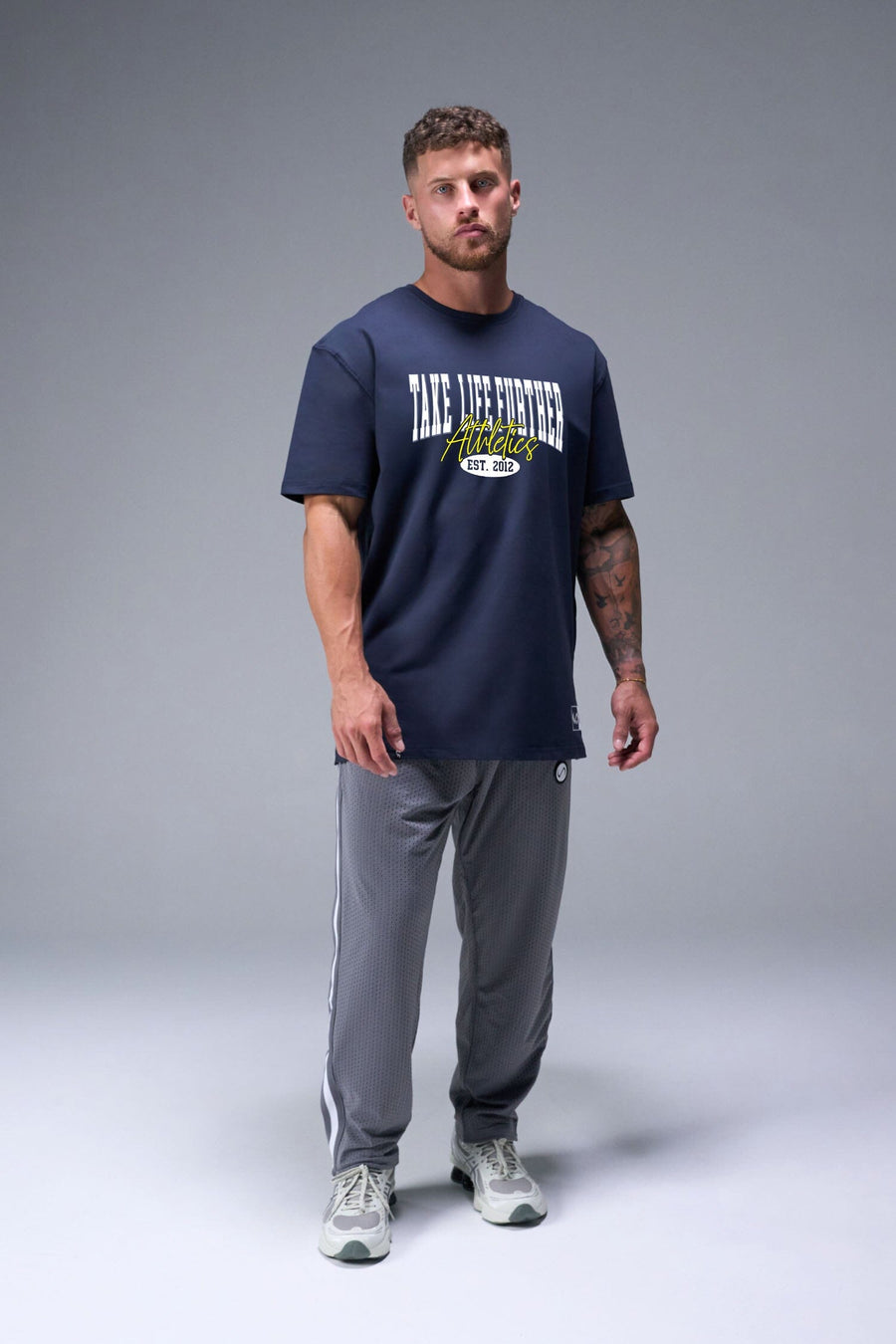 Front View of Blue TLF Athletic Dept Cotton Luxe Oversized Tee featuring a bold 2 one graphic print design across the chest in our oversized shirt fit