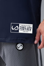 Front View of Blue TLF Athletic Dept Cotton Luxe Oversized Tee featuring a bold 2 one graphic print design across the chest in our oversized shirt fit