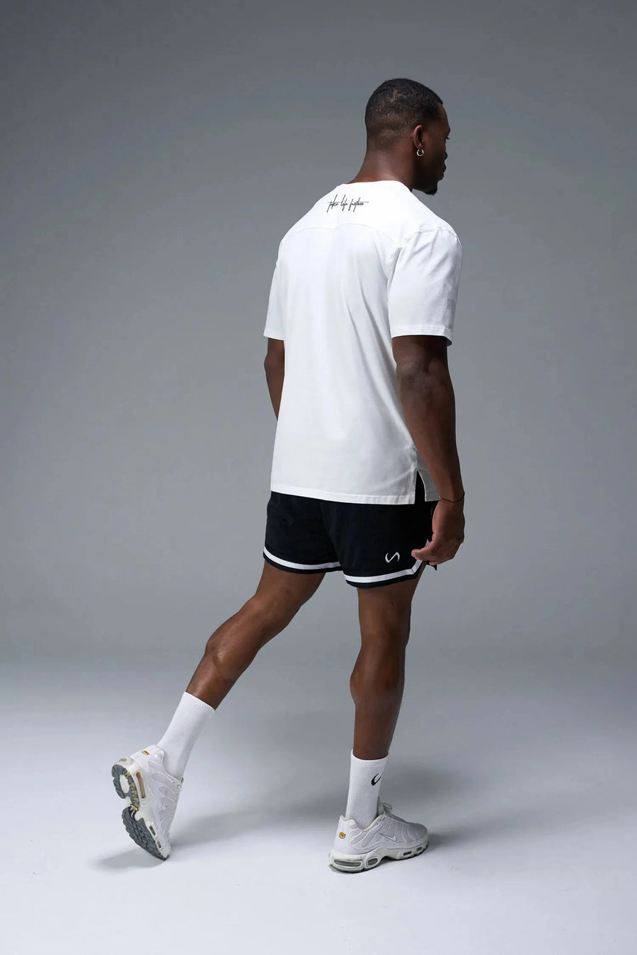 Side View Of Back Script Oversized Tee in White