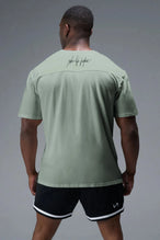 Back View Of Back Script Oversized Tee in Green
