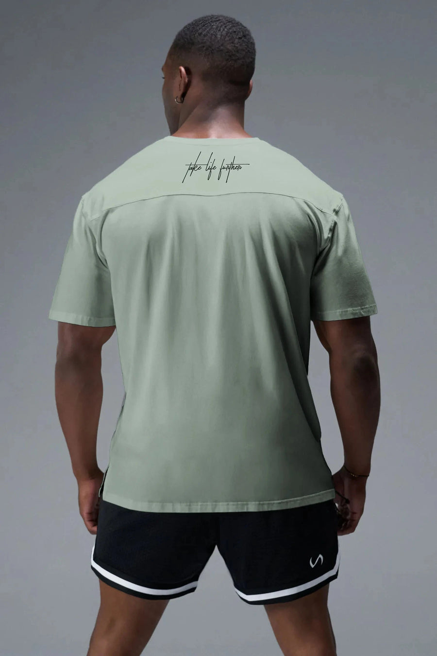 Back View Of Back Script Oversized Tee in Green