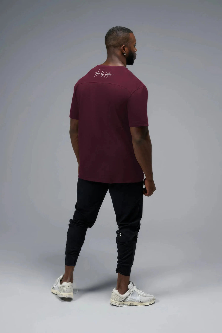 Side View Of Back Script Oversized Tee in Red