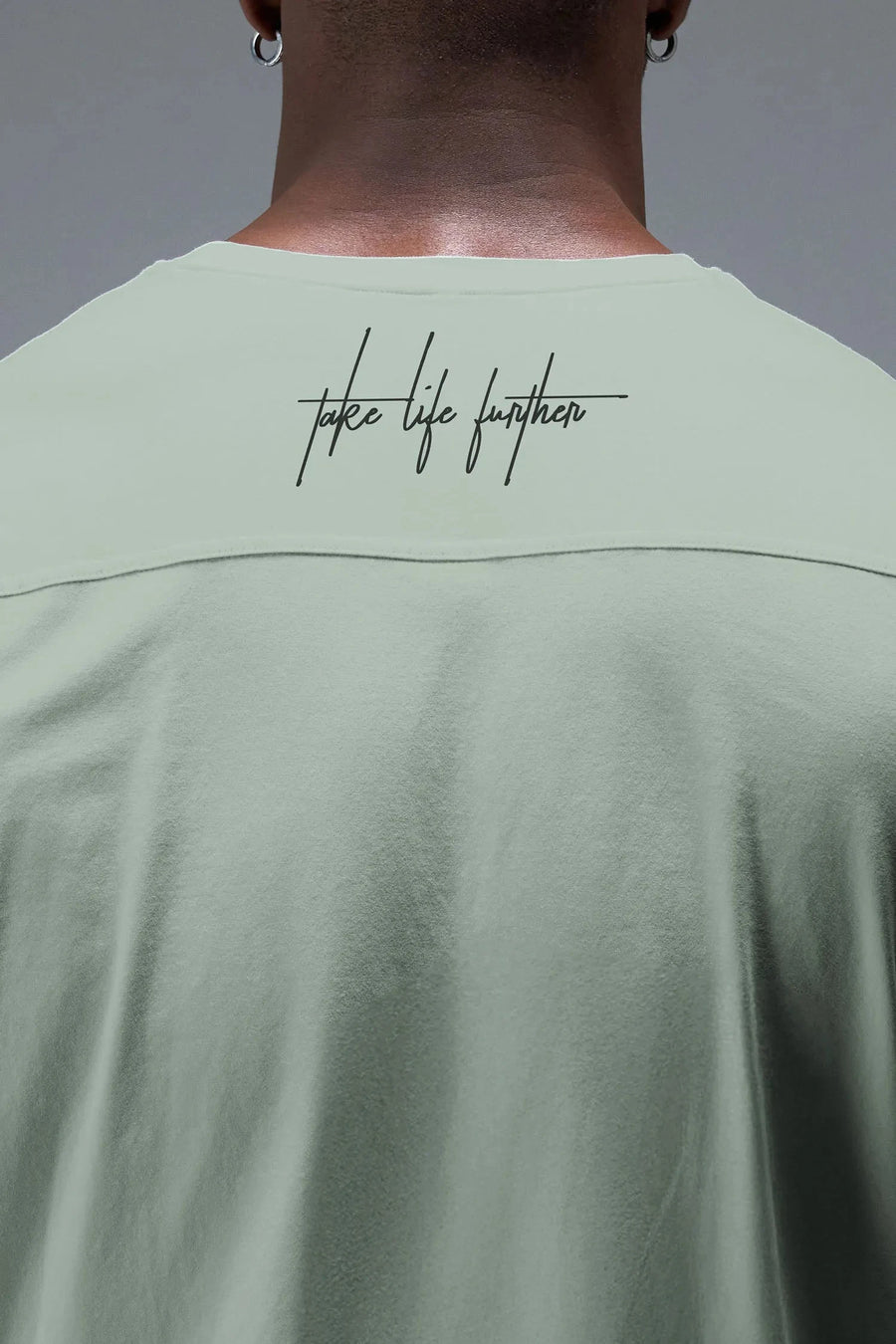 Detail Back View Of Back Script Oversized Tee in Green