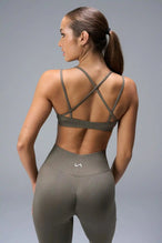 Back View of Brown TLF Cosmic Seamless Strappy Sports, featuring medium impact support and a strappy back design 