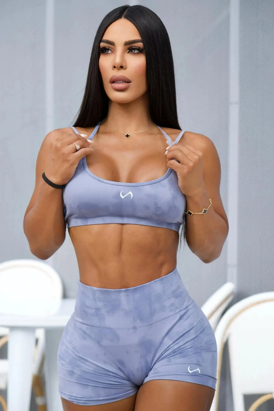 Front View of Blue TLF Cosmic Seamless Strappy Sports, featuring medium impact support and a strappy back design 