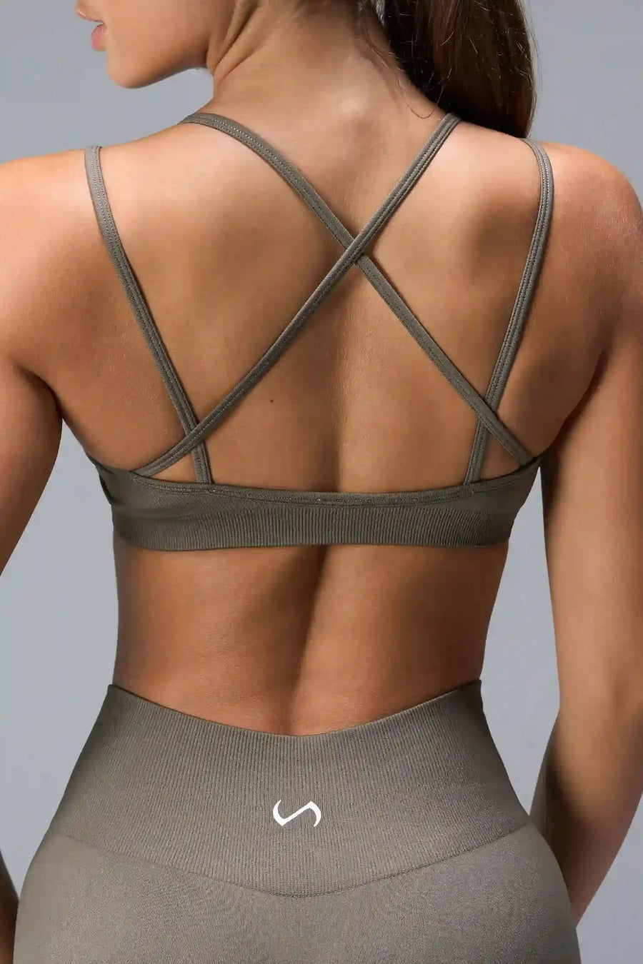 Back View of Brown TLF Cosmic Seamless Strappy Sports, featuring medium impact support and a strappy back design 