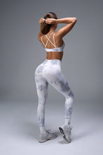 Back View of White TLF Cosmic Seamless Scrunch Butt Leggings, featuring a scrunch butt to shape and contour your glutes 
