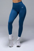 Front View of Blue TLF Cosmic Seamless Scrunch Butt Leggings, featuring a scrunch butt to shape and contour your glutes 