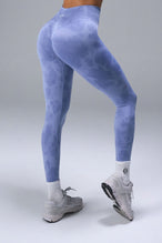 Back View of Blue TLF Cosmic Seamless Scrunch Butt Leggings, featuring a scrunch butt to shape and contour your glutes 