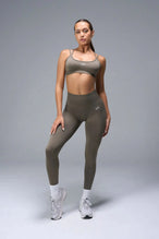 Front View of Brown TLF Cosmic Seamless Scrunch Butt Leggings, featuring a scrunch butt to shape and contour your glutes 