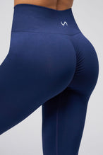 Back View of Cosmic Seamless Scrunch Butt Leggings in Deep Navy