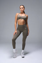Front View of Brown TLF Cosmic Seamless Scrunch Butt Leggings, featuring a scrunch butt to shape and contour your glutes 