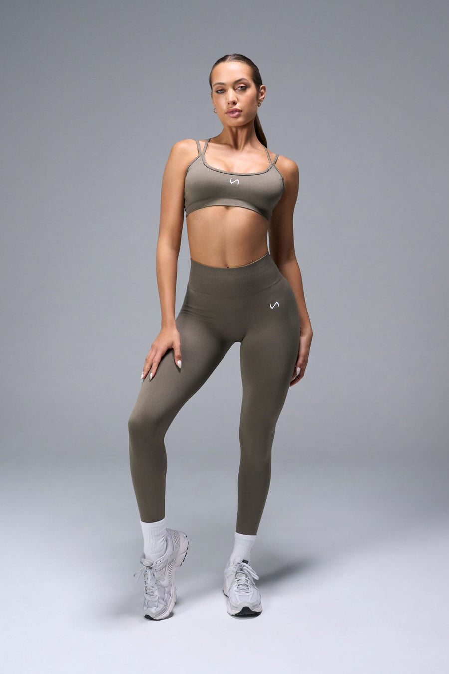 Front View of Brown TLF Cosmic Seamless Scrunch Butt Leggings, featuring a scrunch butt to shape and contour your glutes 