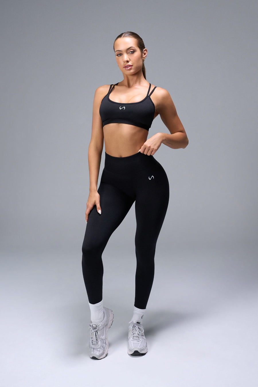 Front View of Black TLF Cosmic Seamless Scrunch Butt Leggings, featuring a scrunch butt to shape and contour your glutes 