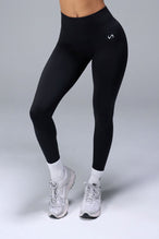 Front View of Black TLF Cosmic Seamless Scrunch Butt Leggings, featuring a scrunch butt to shape and contour your glutes 