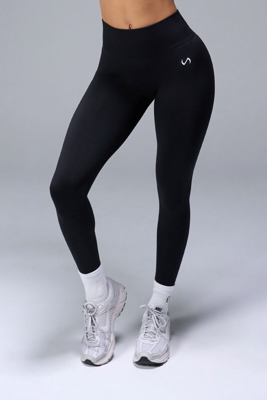 Front View of Black TLF Cosmic Seamless Scrunch Butt Leggings, featuring a scrunch butt to shape and contour your glutes 