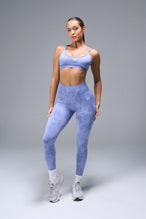 Front View of Blue TLF Cosmic Seamless Scrunch Butt Leggings, featuring a scrunch butt to shape and contour your glutes 