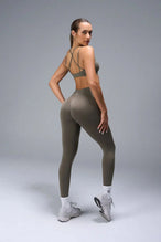 Back View of Brown TLF Cosmic Seamless Scrunch Butt Leggings, featuring a scrunch butt to shape and contour your glutes 