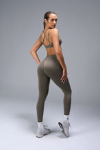Back View of Brown TLF Cosmic Seamless Scrunch Butt Leggings, featuring a scrunch butt to shape and contour your glutes 