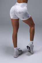 Back View of White TLF Cosmic Seamless Scrunch Butt Shorts, featuring a scrunch butt to shape and contour your glutes 