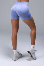 Back View of Blue TLF Cosmic Seamless Scrunch Butt Shorts, featuring a scrunch butt to shape and contour your glutes 